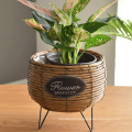 Wholesale price home decor round hand woven plastic rattan flower basket artificial flowers basket for flowers arrangement